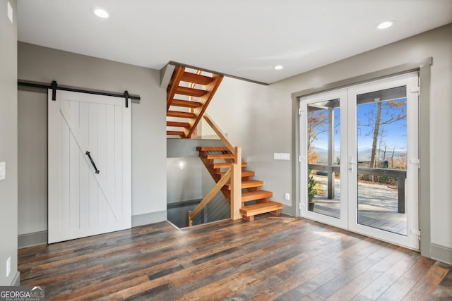 105 Yonah Vw, Dahlonega, GA 30533 - foyer featuring wood finished floors, a barn door, french doors, stairs, and recessed lighting