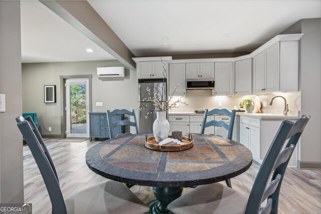 105 Yonah Vw, Dahlonega, GA 30533 - dining room with an AC wall unit, light wood-type flooring, baseboards, and recessed lighting