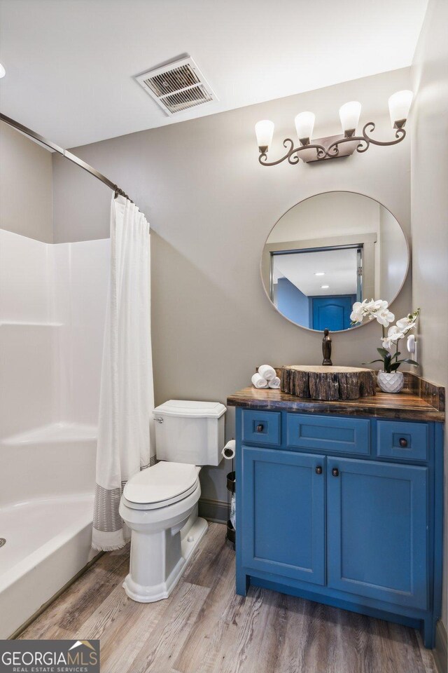 105 Yonah Vw, Dahlonega, GA 30533 - full bath with toilet, wood finished floors, and curtained shower