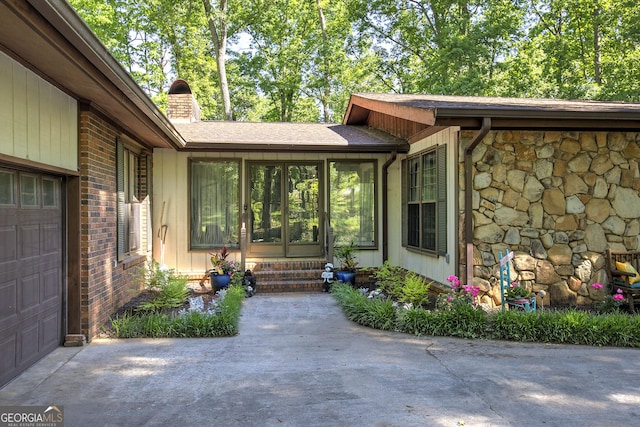 567 Fred Kelley Rd NE, Rome, GA 30161 - entrance to property featuring a chimney, stone siding, and a garage