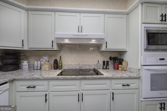 567 Fred Kelley Rd NE, Rome, GA 30161 - kitchen featuring white appliances, under cabinet range hood, and white cabinetry