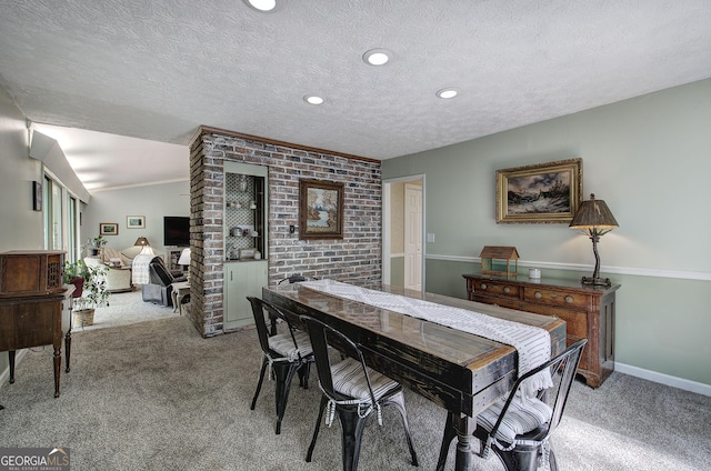 567 Fred Kelley Rd NE, Rome, GA 30161 - dining space with carpet floors, a textured ceiling, and baseboards