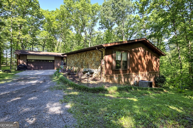 567 Fred Kelley Rd NE, Rome, GA 30161 - view of front of home featuring driveway, brick siding, and central air condition unit