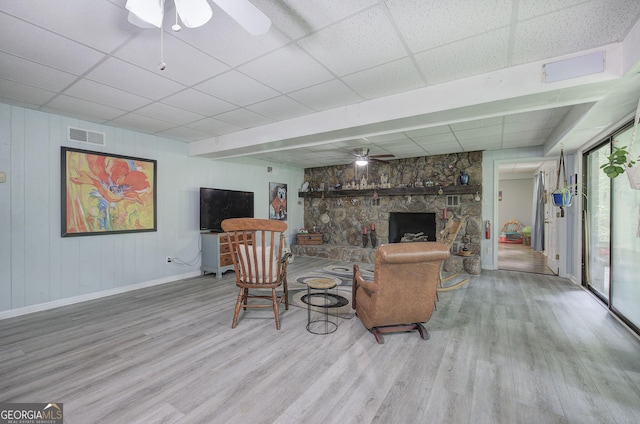 567 Fred Kelley Rd NE, Rome, GA 30161 - living room with a paneled ceiling, ceiling fan, wood finished floors, and baseboards