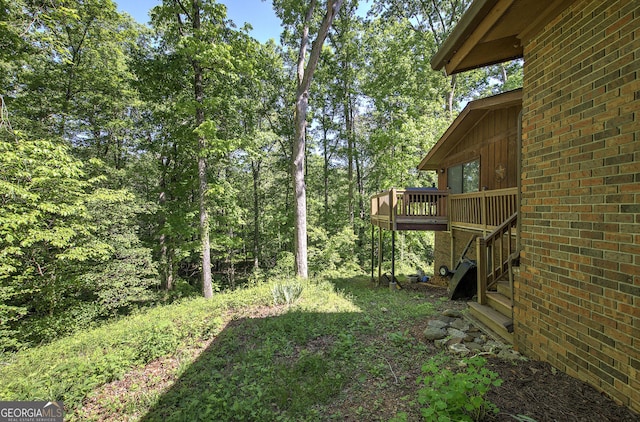 567 Fred Kelley Rd NE, Rome, GA 30161 - view of yard with a deck