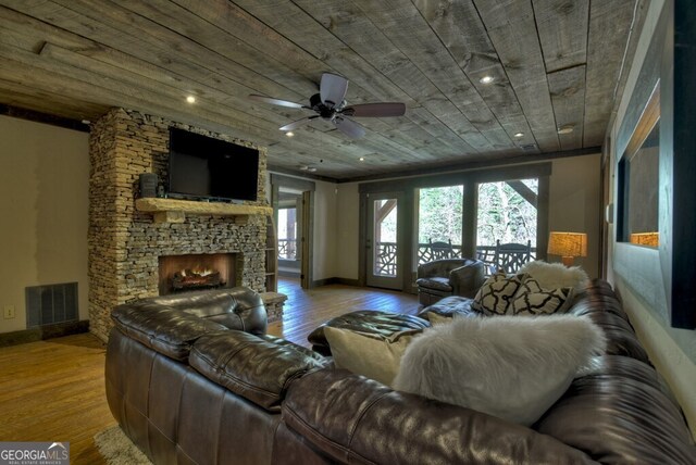 455 Misty Mountain Trl, Morganton, GA 30560 - living area with a fireplace, wooden ceiling, plenty of natural light, hardwood / wood-style flooring, and recessed lighting
