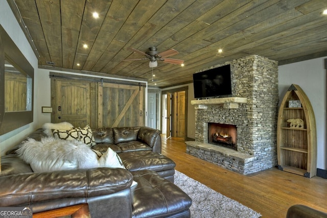 455 Misty Mountain Trl, Morganton, GA 30560 - living room featuring wood ceiling, wood finished floors, ceiling fan, recessed lighting, and a stone fireplace