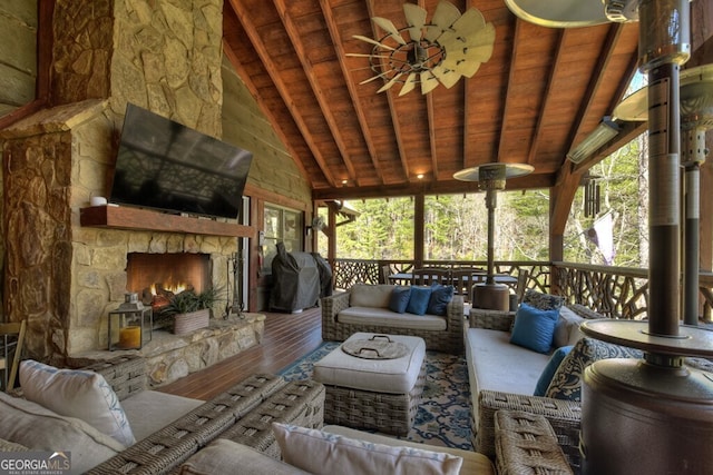 455 Misty Mountain Trl, Morganton, GA 30560 - sunroom / solarium featuring an outdoor living space with a fireplace, plenty of natural light, and a ceiling fan