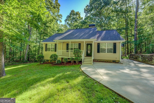view of front facade featuring covered porch, a front lawn, a chimney, concrete driveway, and crawl space