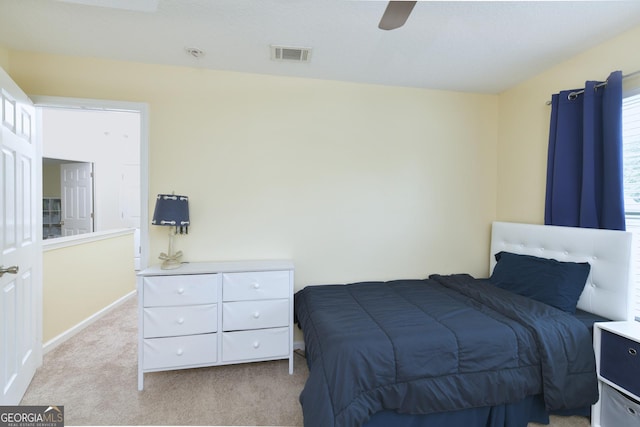 506 Hide Away Lake Loop, Kingsland, GA 31548 - bedroom with light colored carpet, baseboards, and ceiling fan