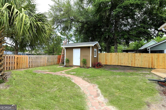 506 Hide Away Lake Loop, Kingsland, GA 31548 - view of yard with an outdoor structure and a storage shed
