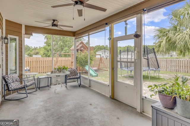 506 Hide Away Lake Loop, Kingsland, GA 31548 - sunroom with ceiling fan and plenty of natural light