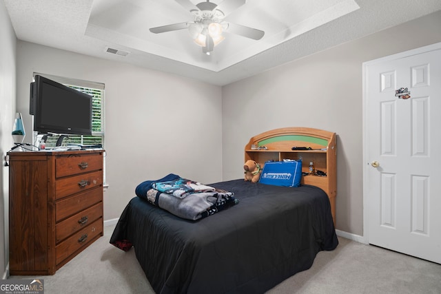 96 Ashtonbrook Dr, Mcdonough, GA 30252 - bedroom featuring carpet flooring, a raised ceiling, ceiling fan, and baseboards