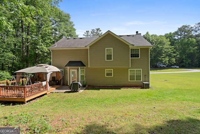 96 Ashtonbrook Dr, Mcdonough, GA 30252 - rear view of house with a wooden deck, a yard, a gazebo, and cooling unit