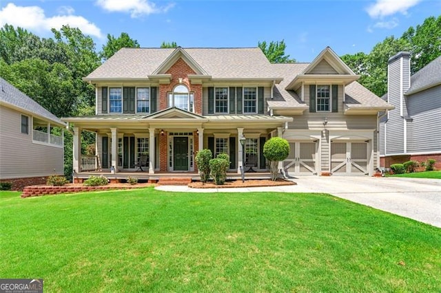 5652 Harbormist Dr, Powder Springs, GA 30127 - view of front of home featuring concrete driveway, a front lawn, a porch, and brick siding