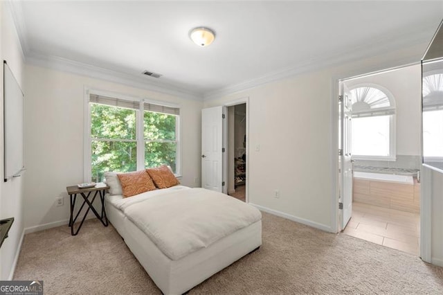 5652 Harbormist Dr, Powder Springs, GA 30127 - bedroom with multiple windows, ornamental molding, light carpet, baseboards, and connected bathroom