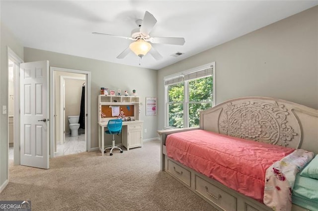 5652 Harbormist Dr, Powder Springs, GA 30127 - bedroom featuring carpet flooring, baseboards, ensuite bathroom, and a ceiling fan