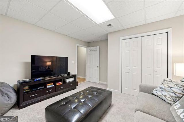 5652 Harbormist Dr, Powder Springs, GA 30127 - carpeted living room with a paneled ceiling and baseboards