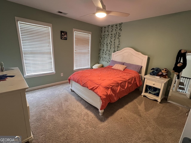 5652 Harbormist Dr, Powder Springs, GA 30127 - bedroom with carpet flooring, a ceiling fan, and baseboards