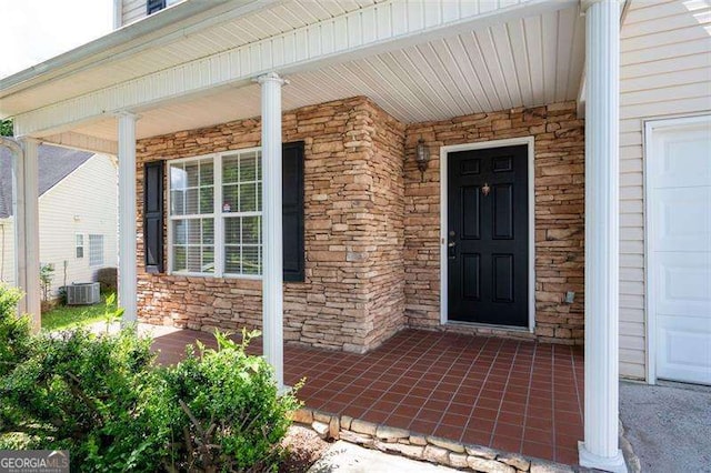 45 Waterloo Ct, Hiram, GA 30141 - doorway to property featuring a porch and stone siding