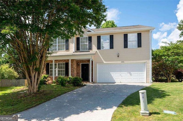 traditional-style home with a garage and concrete driveway