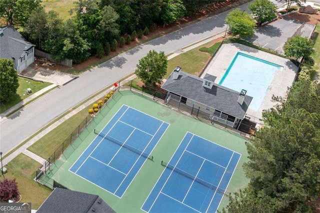 drone / aerial view of a pool