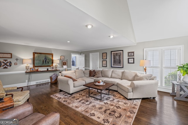 living room with dark wood-style flooring, ornamental molding, recessed lighting, and baseboards