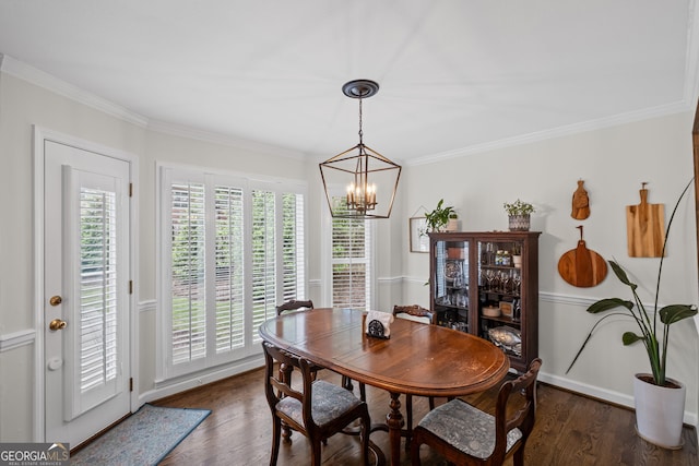 dining area with a chandelier, dark wood-style floors, and crown molding