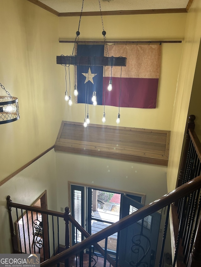 1627 Leguin Mill Rd, Locust Grove, GA 30248 - stairway with crown molding