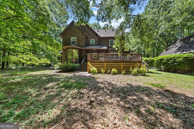 rear view of property with a deck