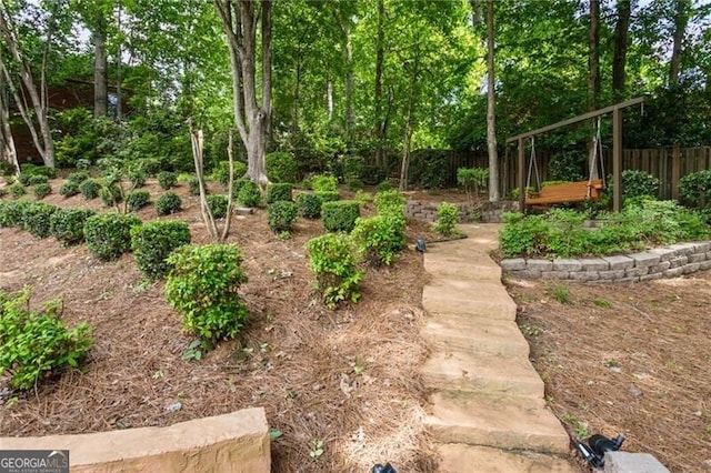 view of yard featuring fence