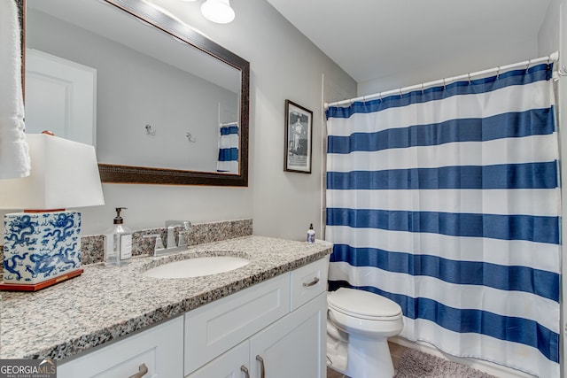 131 Village Dr, Clarkesville, GA 30523 - full bath featuring toilet, vanity, tile patterned floors, and a shower with shower curtain