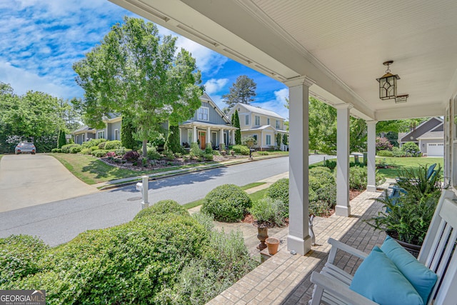 131 Village Dr, Clarkesville, GA 30523 - view of patio featuring a residential view and a porch