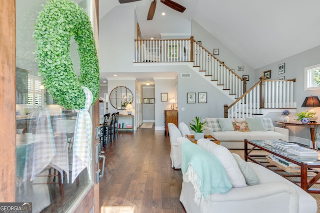 131 Village Dr, Clarkesville, GA 30523 - living area featuring high vaulted ceiling, stairs, a ceiling fan, wood finished floors, and baseboards