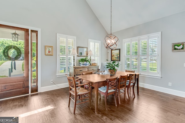 131 Village Dr, Clarkesville, GA 30523 - dining space featuring a chandelier, high vaulted ceiling, baseboards, and healthy amount of natural light