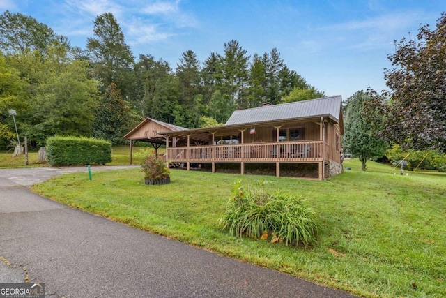 456 Pickelsimer Rd, Blairsville, GA 30512 - view of front of home with a front yard, a porch, a chimney, metal roof, and board and batten siding