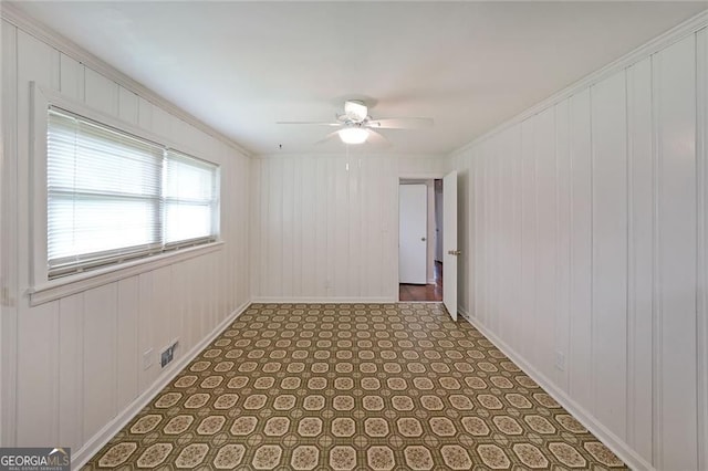 629 Birchwood Rd, Marietta, GA 30060 - spare room with a ceiling fan, baseboards, and ornamental molding