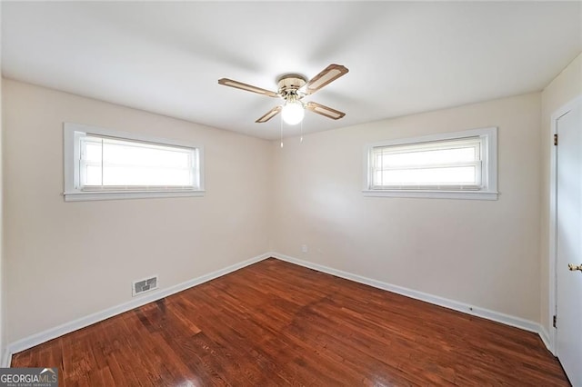 629 Birchwood Rd, Marietta, GA 30060 - empty room featuring plenty of natural light, baseboards, and ceiling fan