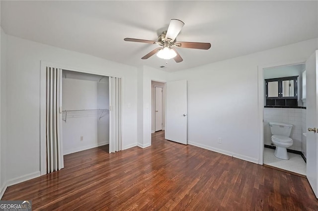 629 Birchwood Rd, Marietta, GA 30060 - unfurnished bedroom featuring wood finished floors, a closet, connected bathroom, ceiling fan, and baseboards