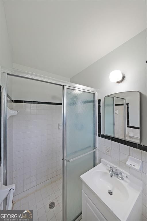 629 Birchwood Rd, Marietta, GA 30060 - bathroom featuring a stall shower and vanity