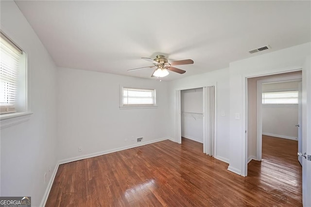629 Birchwood Rd, Marietta, GA 30060 - unfurnished bedroom featuring a closet, wood finished floors, baseboards, and a ceiling fan