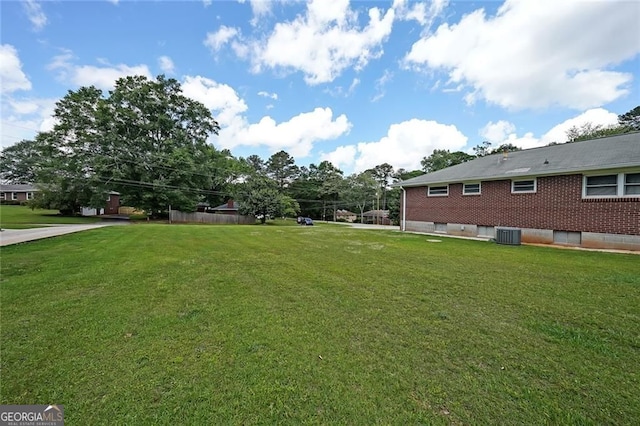 629 Birchwood Rd, Marietta, GA 30060 - view of green lawn with central air condition unit
