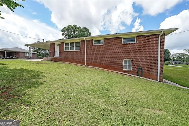 629 Birchwood Rd, Marietta, GA 30060 - view of front of home with a front yard and brick siding