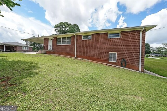 629 Birchwood Rd, Marietta, GA 30060 - view of front of property featuring a front lawn and brick siding