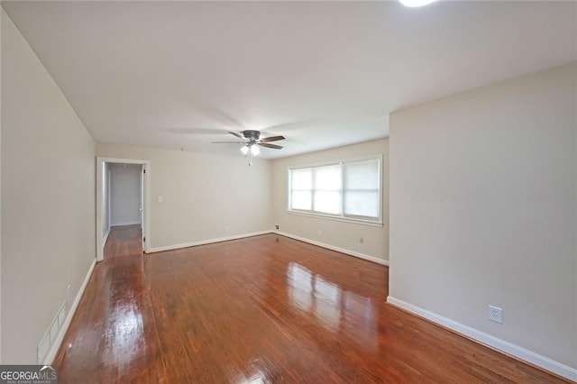 629 Birchwood Rd, Marietta, GA 30060 - empty room featuring ceiling fan, wood finished floors, and baseboards