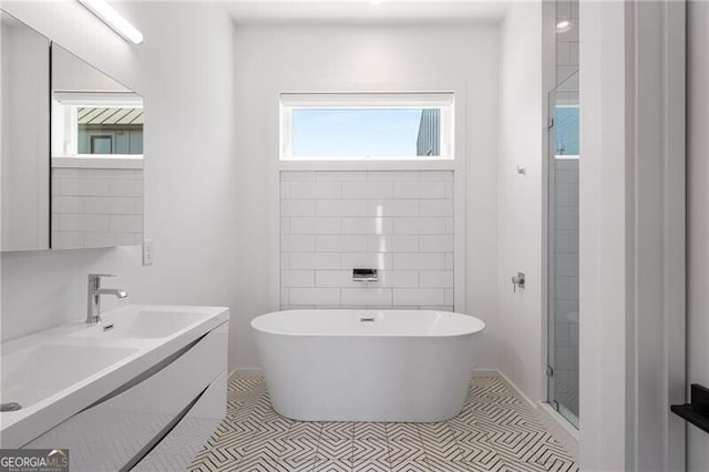 53 Daniel St SE, Atlanta, GA 30312 - full bath with a freestanding bath, vanity, and a shower stall