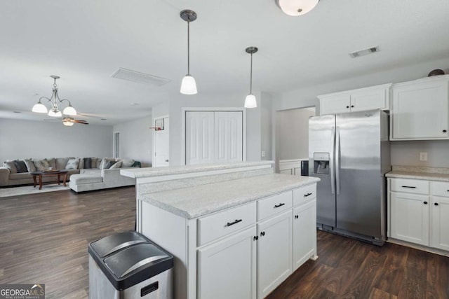309 Nashview Trl, Allenhurst, GA 31301 - kitchen featuring stainless steel fridge with ice dispenser, a kitchen island, open floor plan, and dark wood finished floors