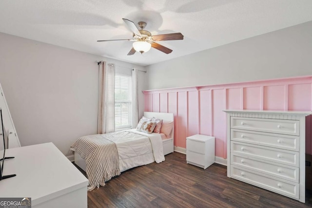 309 Nashview Trl, Allenhurst, GA 31301 - bedroom featuring dark wood-type flooring, wainscoting, and ceiling fan