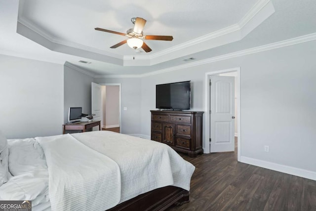 309 Nashview Trl, Allenhurst, GA 31301 - bedroom with a raised ceiling, dark wood-type flooring, ornamental molding, baseboards, and ceiling fan