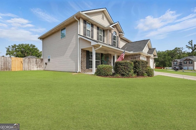 309 Nashview Trl, Allenhurst, GA 31301 - view of home's exterior with concrete driveway, an attached garage, and brick siding